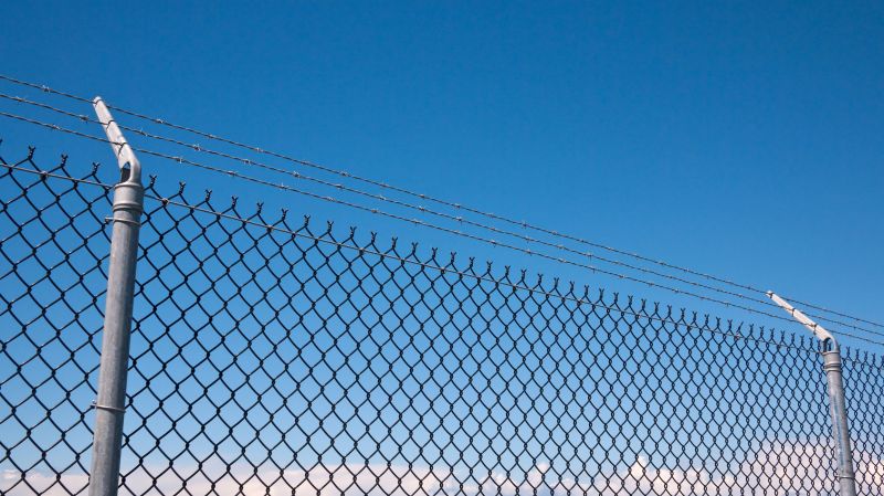 Chain Link with Barbed Wire